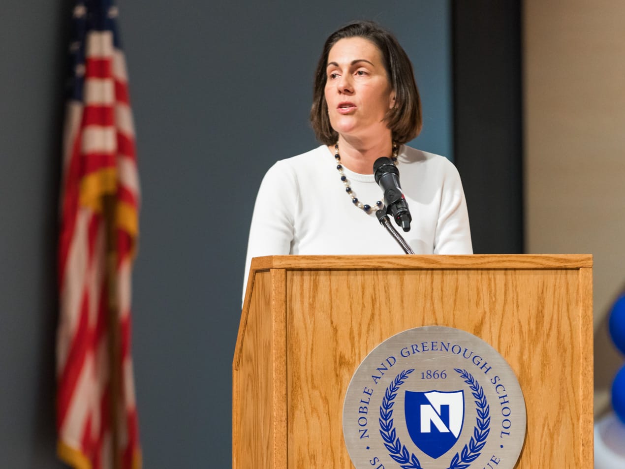 Cathy Hall speaking at a graduation