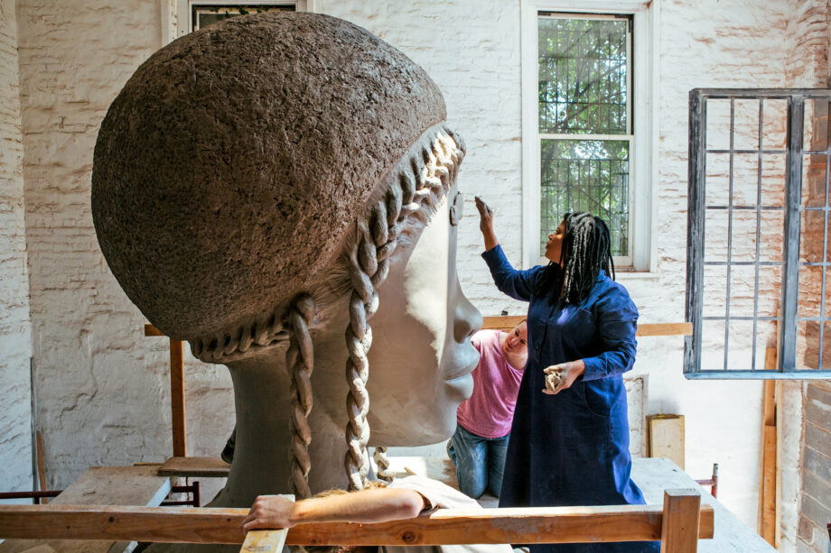 Simone Leigh with her work, "Brick House"